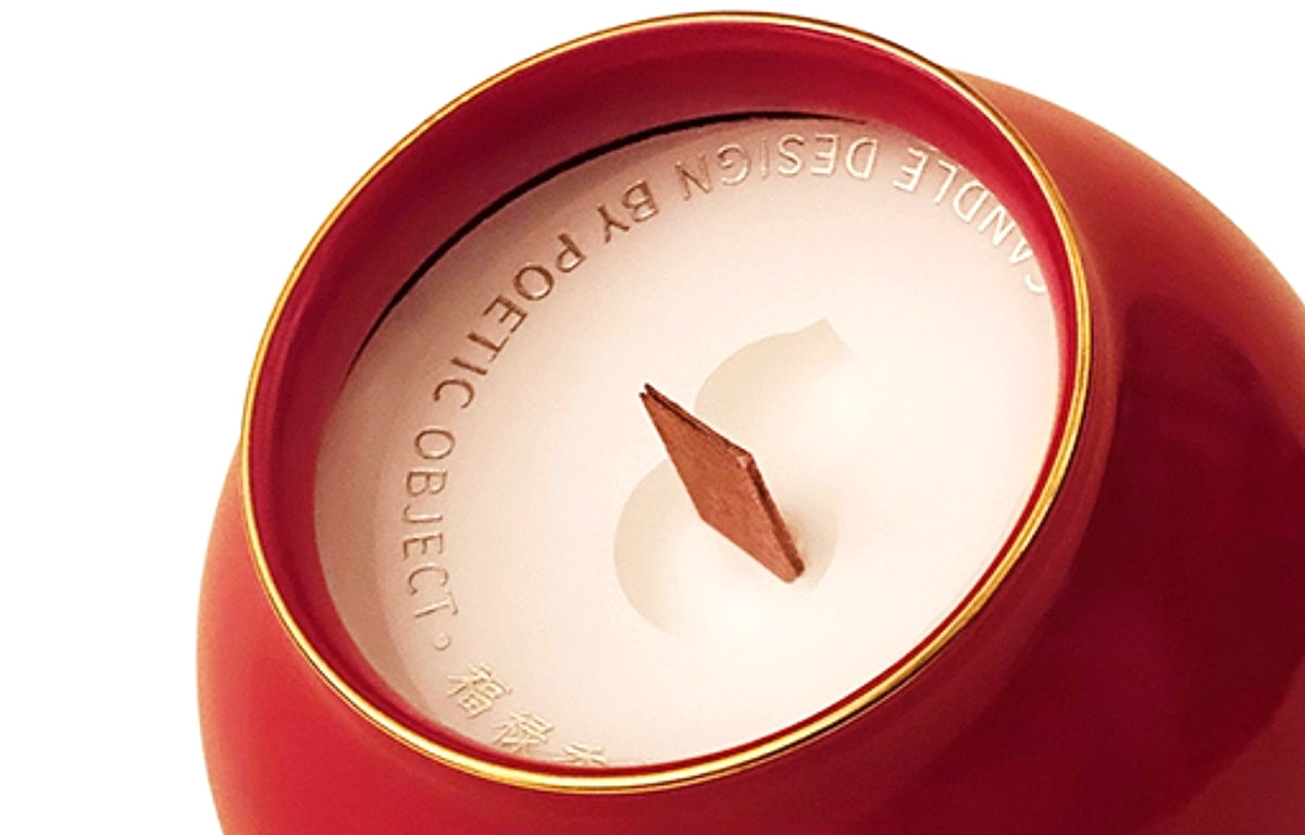 Close-up of natural plant wax and a double-layered wood wick inside a red Dehua porcelain candle jar